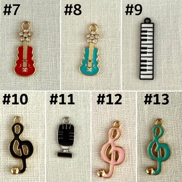 Music Themed Charms Set Of 7 Assorted Colors Treble Clef Piano Violin Mic Crafts - Picture 2 of 9